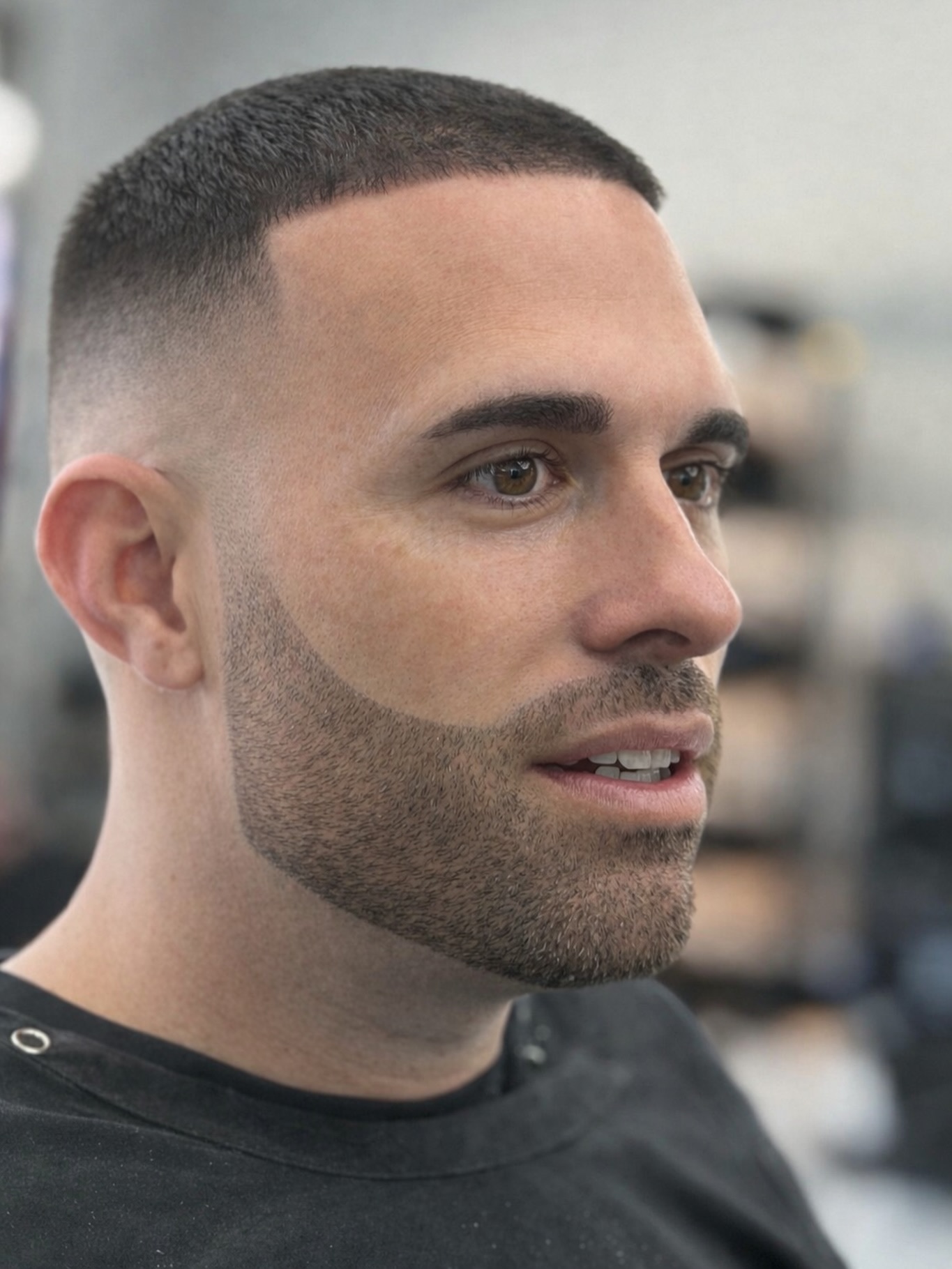 Clean low fade with beard line by Caio