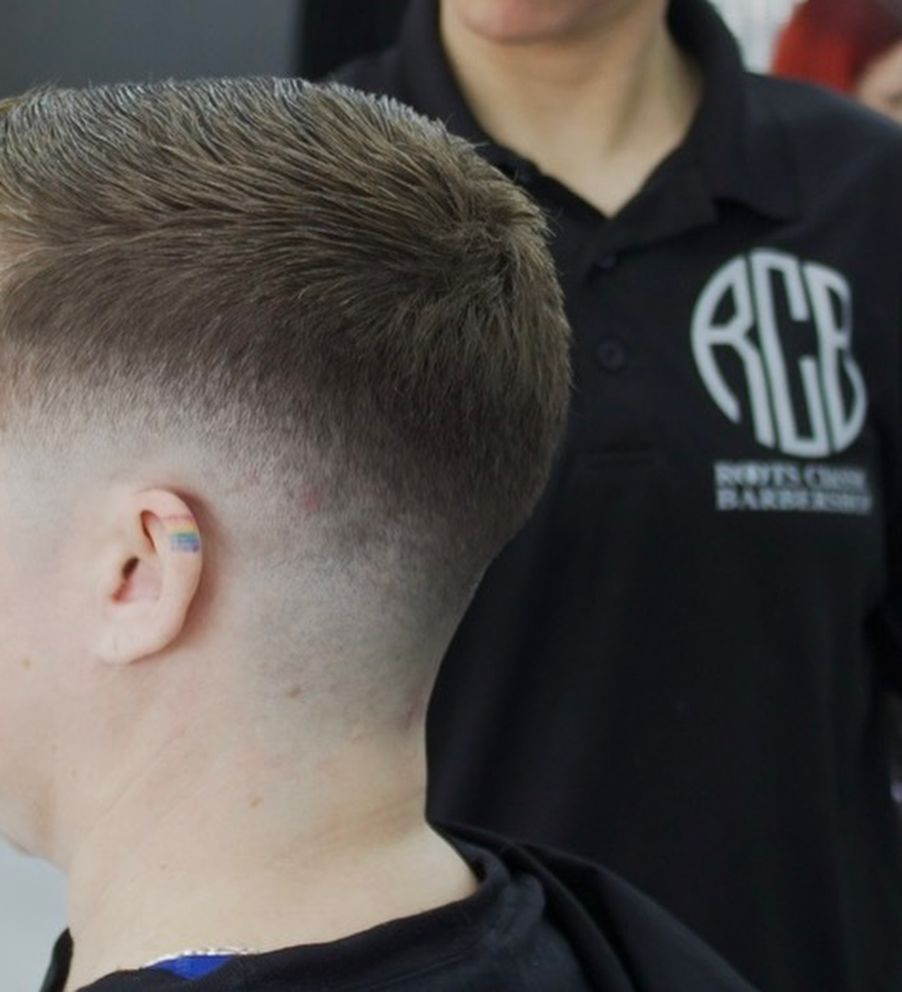 Clean fade with textured top by Hailey