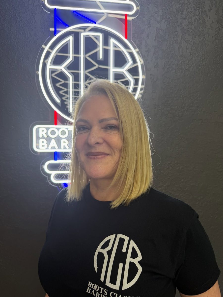 Rose, owner of Rose Beauty Studio, at Roots Classic Barbershop